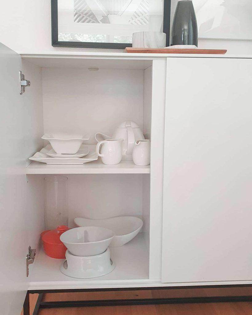 Dishes inside cabinet